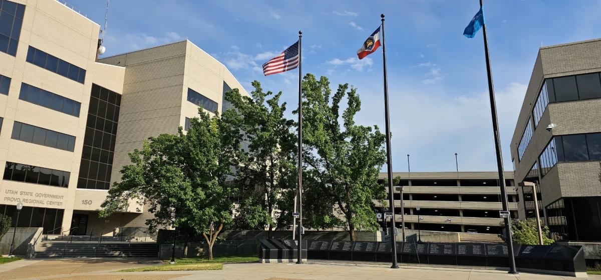 Flags flying at half-staff outside a government center